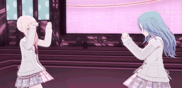 two anime girls standing next to each other in a room