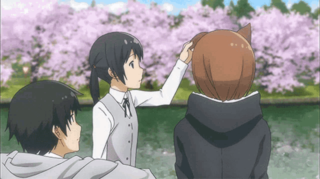 three anime characters are standing in front of cherry blossoms