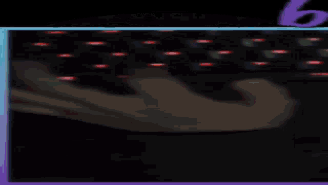 a close up of a person 's hand using a keyboard