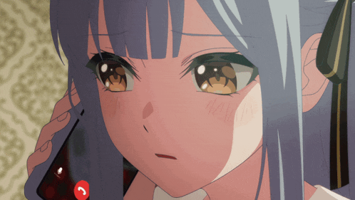 a close up of a girl talking on a cellphone
