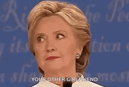hillary clinton is making a funny face and says `` your other girlfriend '' .