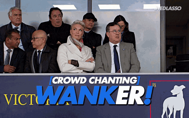 a group of people sitting in a stadium with the words crowd chanting wanker