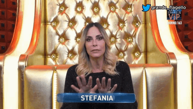a woman sitting in a chair with the name stefania on the front