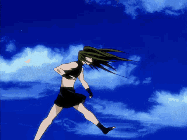 a man and a woman are jumping in the air with a blue sky behind them