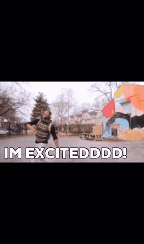 a man standing in a park with the words im excitedddd written on the bottom