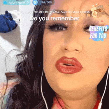 a woman wearing ear buds has a sticker on her face that says " do you remember benefits for you "