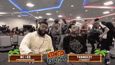 two men are playing a video game called bongo saga