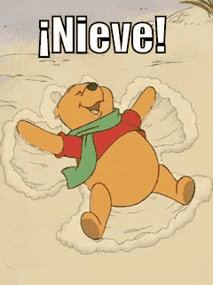a cartoon of winnie the pooh making a snow angel with the words nieve above him