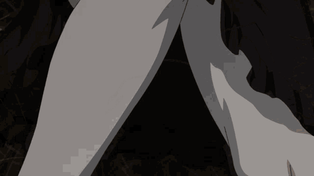 a close up of a person 's legs with a few holes in them