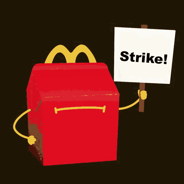 a happy meal holding a sign that says " strike "