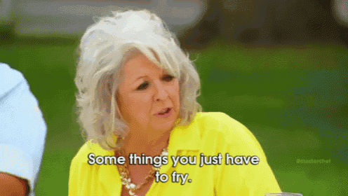 a woman in a yellow shirt is sitting at a table and saying `` some things you just have to try '' .