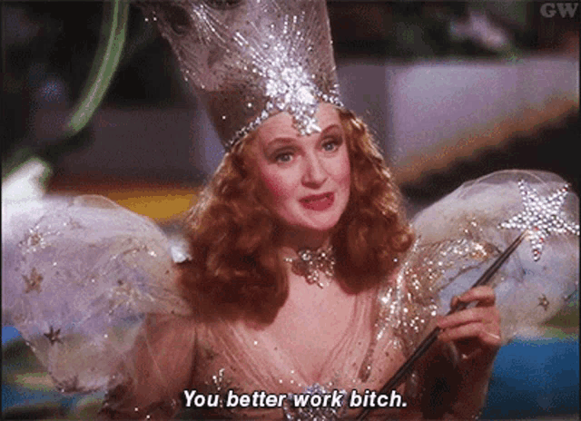 a woman in a fairy costume is holding a wand and saying " you better work bitch "
