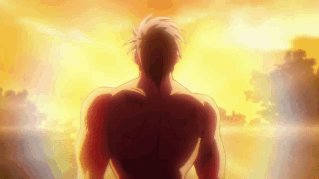 a man without a shirt is standing in front of a sunset with his back to the camera .