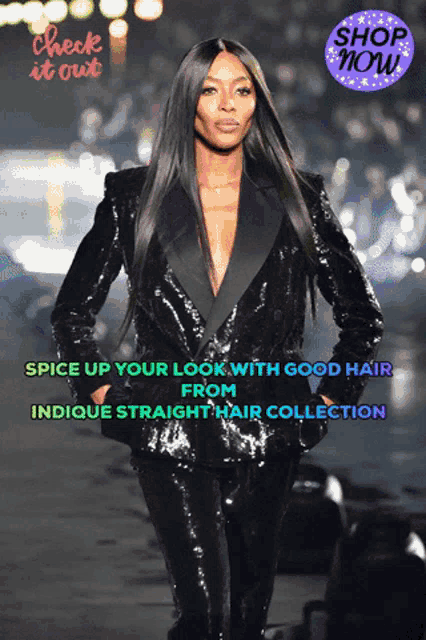 a woman in a sequined suit is standing in front of a shop now button