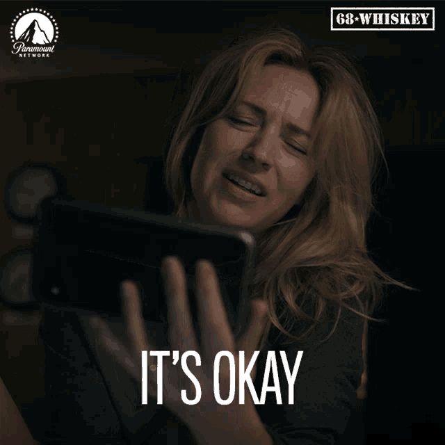a paramount network ad shows a woman laughing while looking at her phone