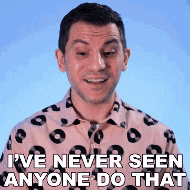 a man in a leopard print shirt says i ve never seen anyone do that