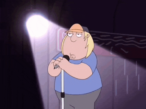 a cartoon character singing into a microphone with a spotlight behind him