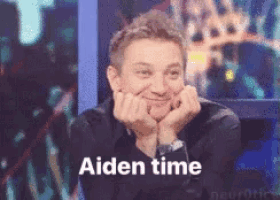 a man with his hands on his face and the words aiden time on the bottom