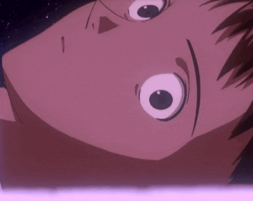 a close up of a person 's face with their eyes open