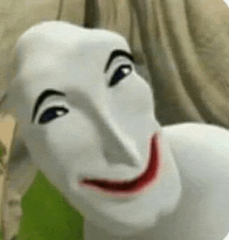 a close up of a cartoon character 's face with a smiling face .