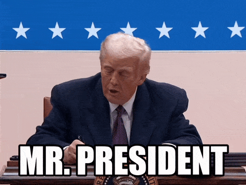 a man in a suit and tie is sitting at a desk with the words " mr. president " above him