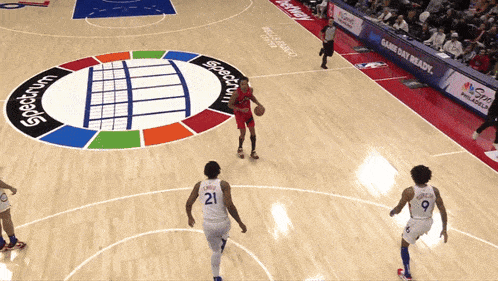 a basketball game is being played on the spectrum court