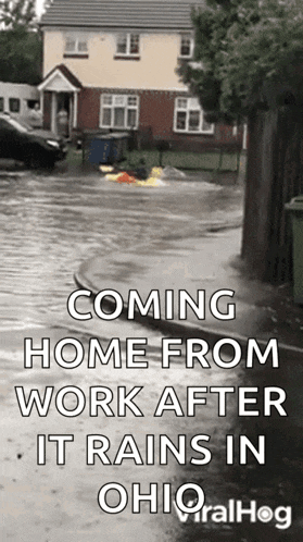 a flooded street with the words coming home from work after it rains in ohio viralhog