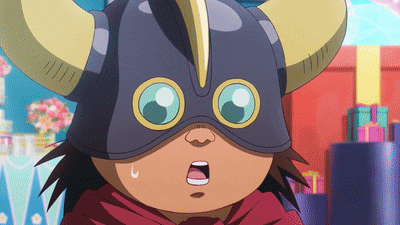 a close up of a cartoon character wearing a helmet with horns