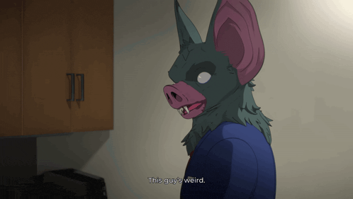 a cartoon character with a bat mask on says " this guy 's weird "
