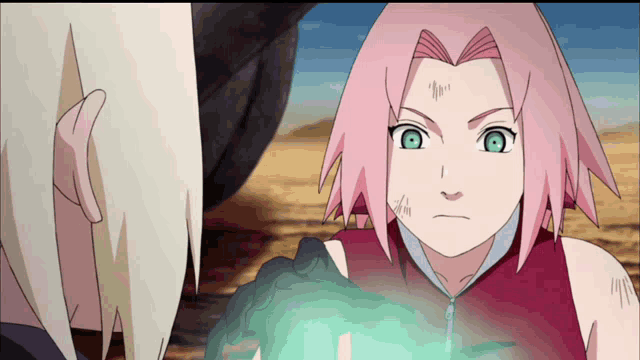 a girl with pink hair and green eyes stands next to a girl with blonde hair