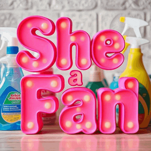 a sign that says she is a fan is lit up