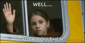 a little girl is waving her hand out of a window .
