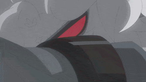 a close up of a cartoon character 's face with a red nose