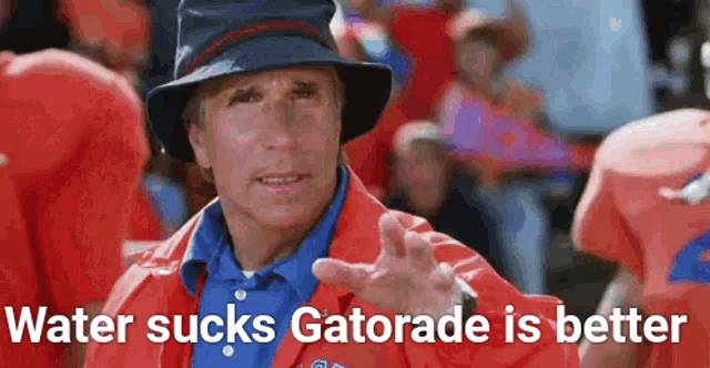 a man wearing a hat and an orange jacket says " water sucks gatorade is better "
