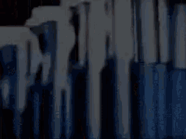 a blurred image of a staircase with smoke coming out of it .