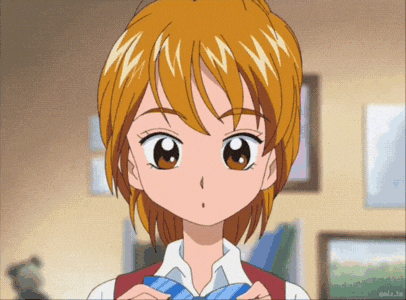 a girl with orange hair is wearing a red vest and a blue tie