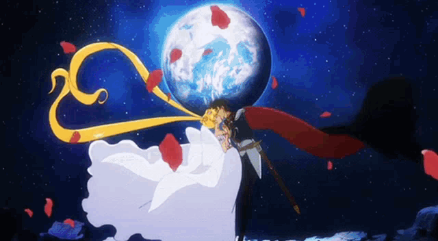 a bride and groom kissing in front of a moon