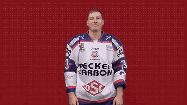 a man wearing a becke carbon jersey smiles for the camera