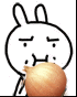 a cartoon rabbit is eating an onion with a funny face .