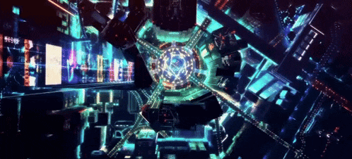 an aerial view of a city at night with a circle in the middle
