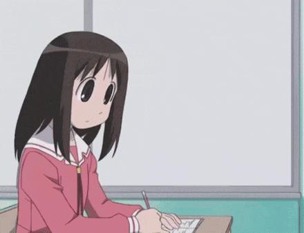 a cartoon girl is sitting at a desk in front of a white board