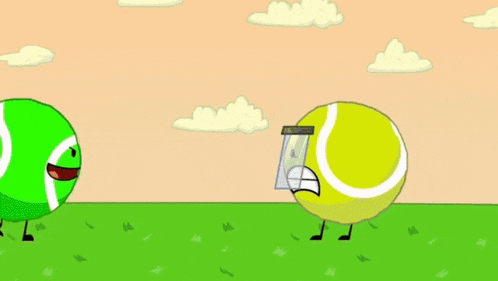 two tennis balls are standing next to each other in a grassy field .