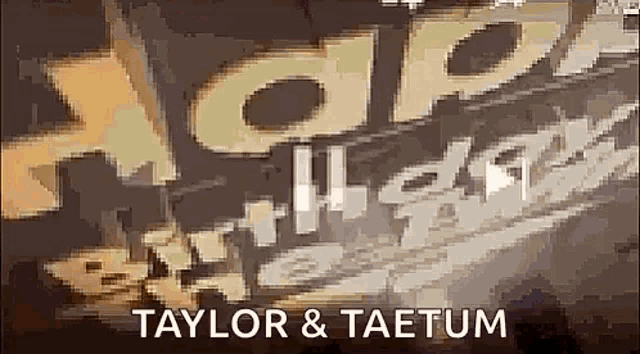a picture of a sign that says happy birthday taylor & taetum