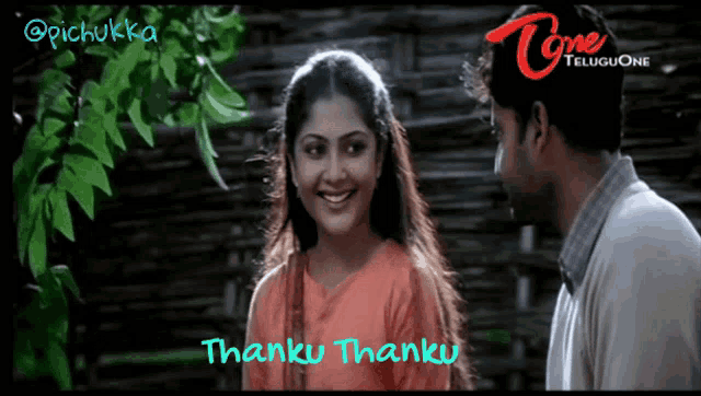 a man and a woman are smiling and the words thanku thanku are on the screen