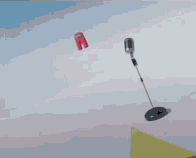 a red among us character is flying through the air on a blue background .