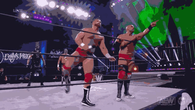 two wrestlers are standing in a ring with aew written on the bottom