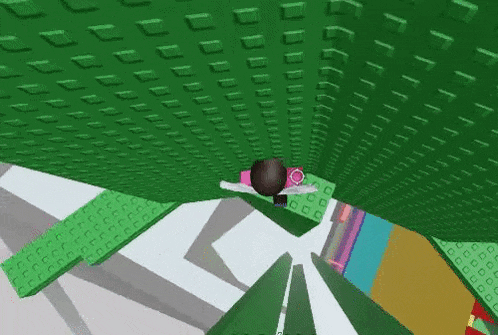 a person is flying through the air in a video game with a green background .