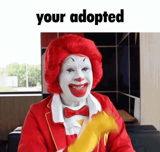 a picture of mcdonald 's clown with the words your adopted