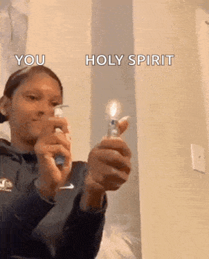 a woman is lighting a cigarette with a lighter and a spray bottle .