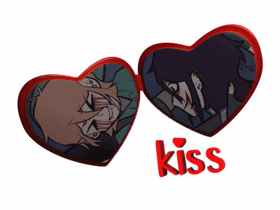 a red heart with a picture of two people and the word kiss